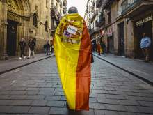 Испанца убили за подтяжки с флагом страны