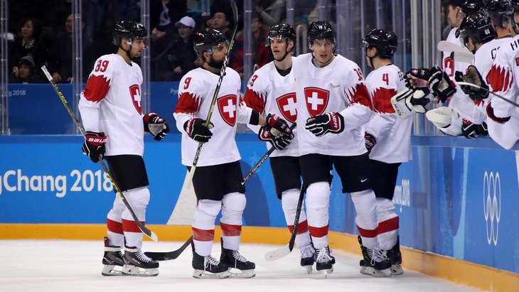 Швейцарские хоккеисты отгрузили корейцам восемь шайб